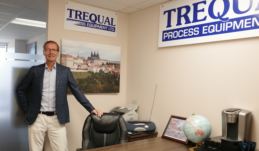 Milan standing at the office